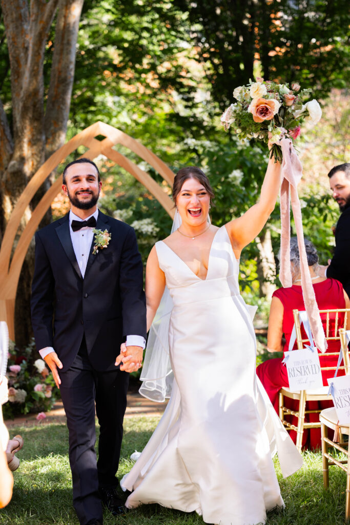 bride and groom celebrating after their Taft Museum of Art wedding ceremony
