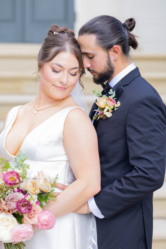 portrait of a Taft Museum of Art wedding couple on the stairs of the main entrance
