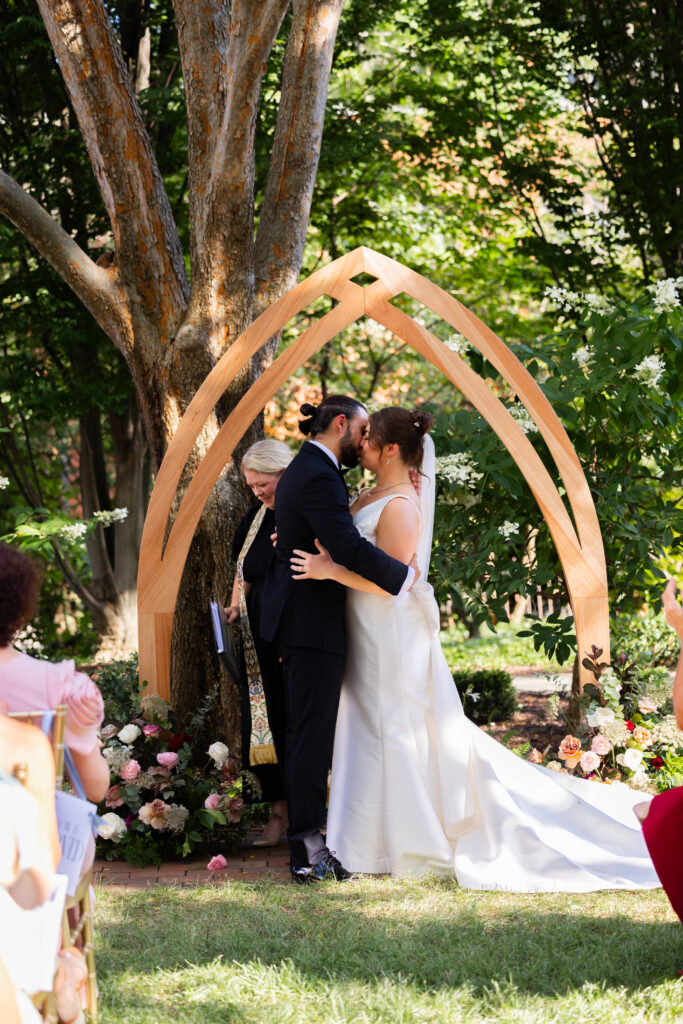 bride and groom kissing at their Taft Museum of Art wedding ceremony